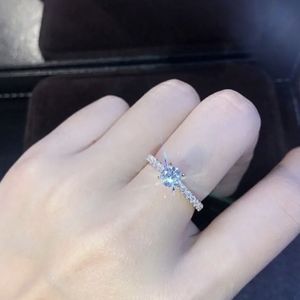 NEW silver plated small zircon in the center with smaller stones inlaid on the